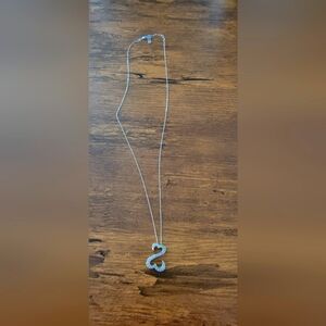 Open heart diamond necklace.